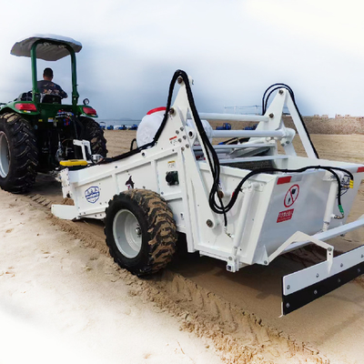 Stalowa maszyna do czyszczenia plaży z ładowarkami skid steer